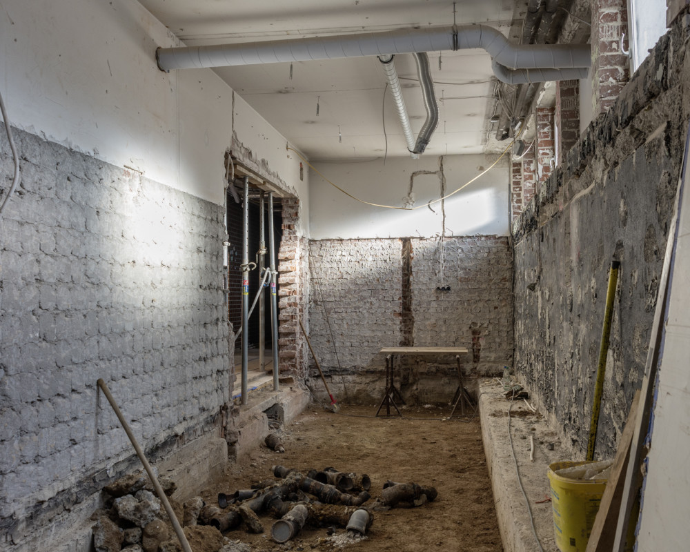 Waschraum & Aufzugschacht